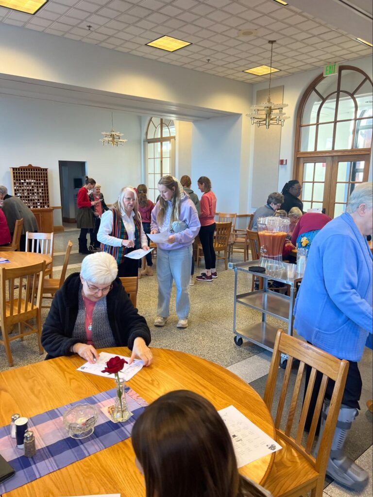 Middle school girls visit with the Sisters of St. Benedict