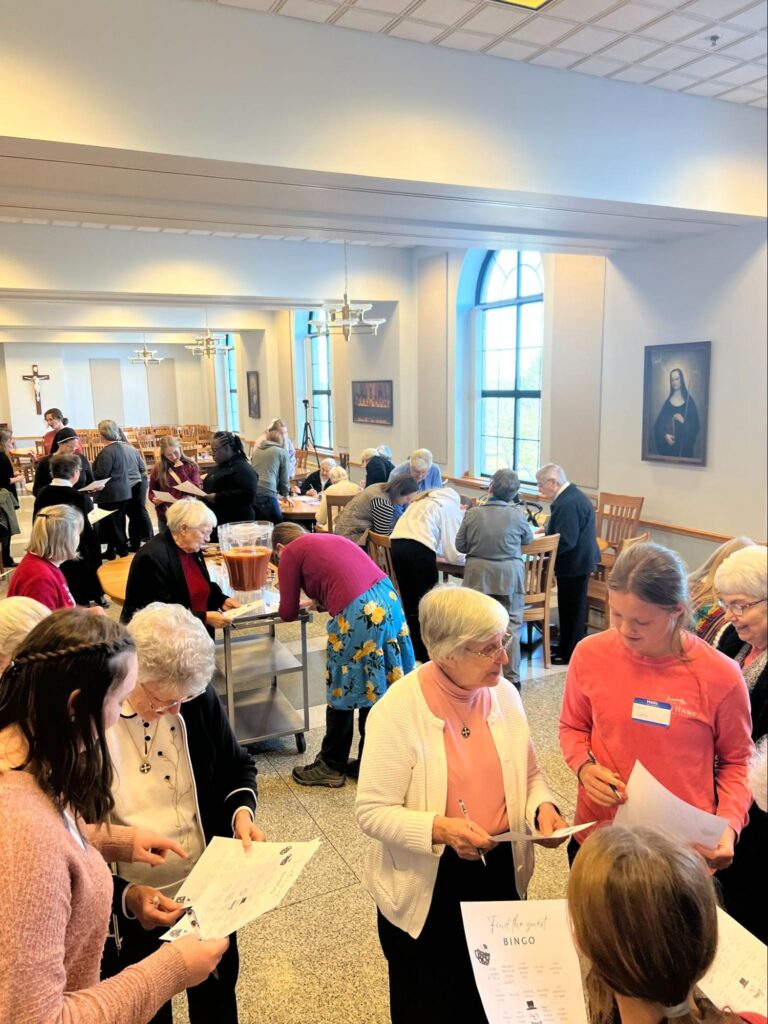 Middle school girls visit with the Sisters of St. Benedict