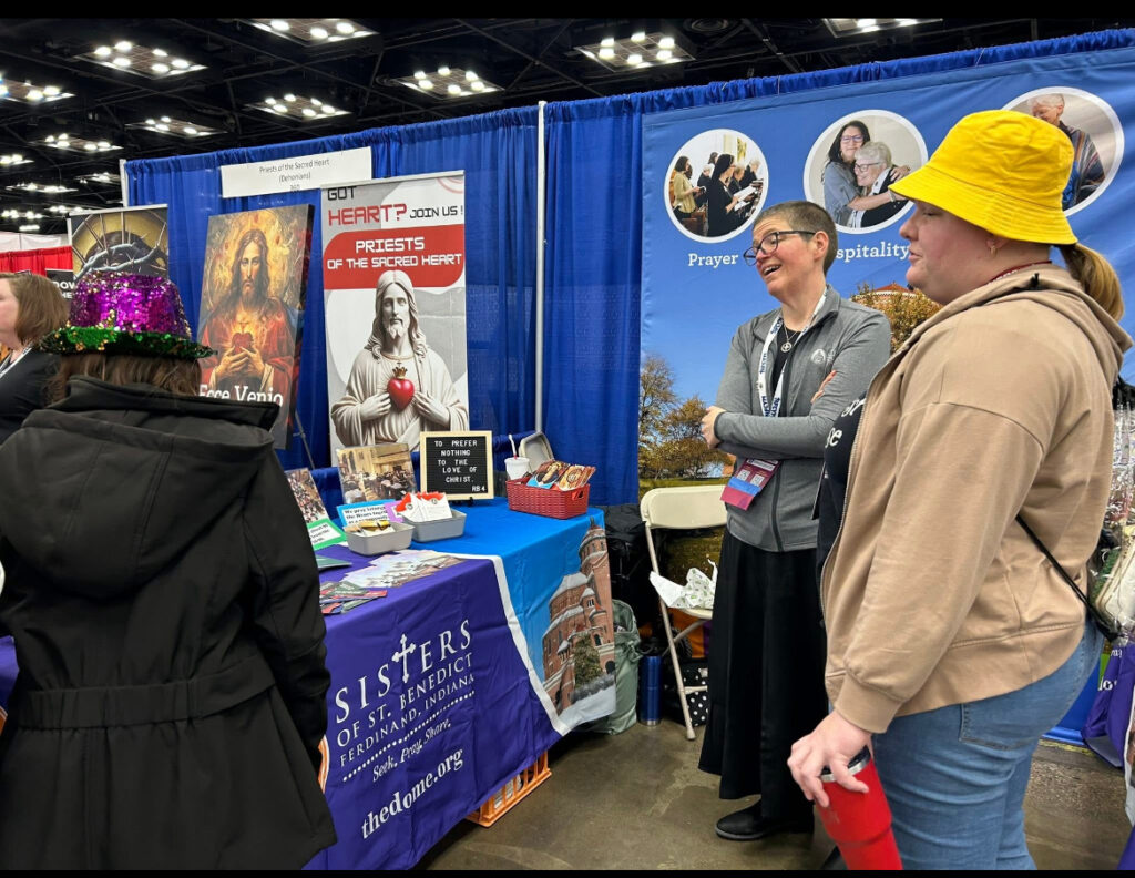 Sister Jill talking to guests at National Catholic Youth Conference