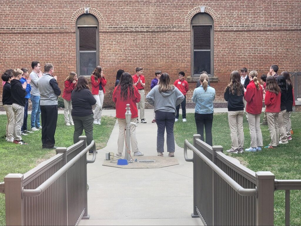 Students in Monastery Immaculate Conception courtyard playing Ninja Circle Game
